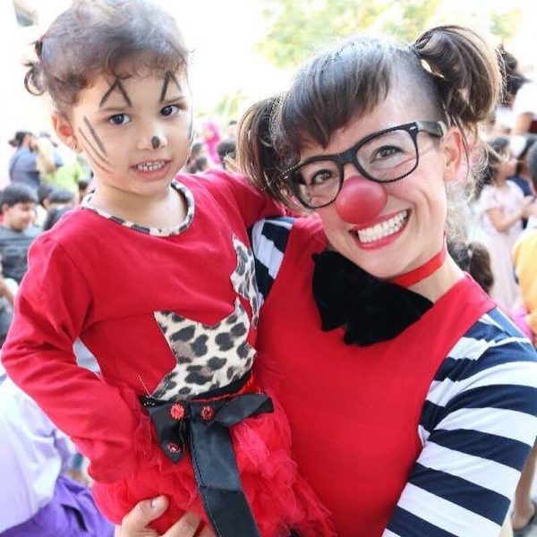 Hannah with an audience member in Lebanon.